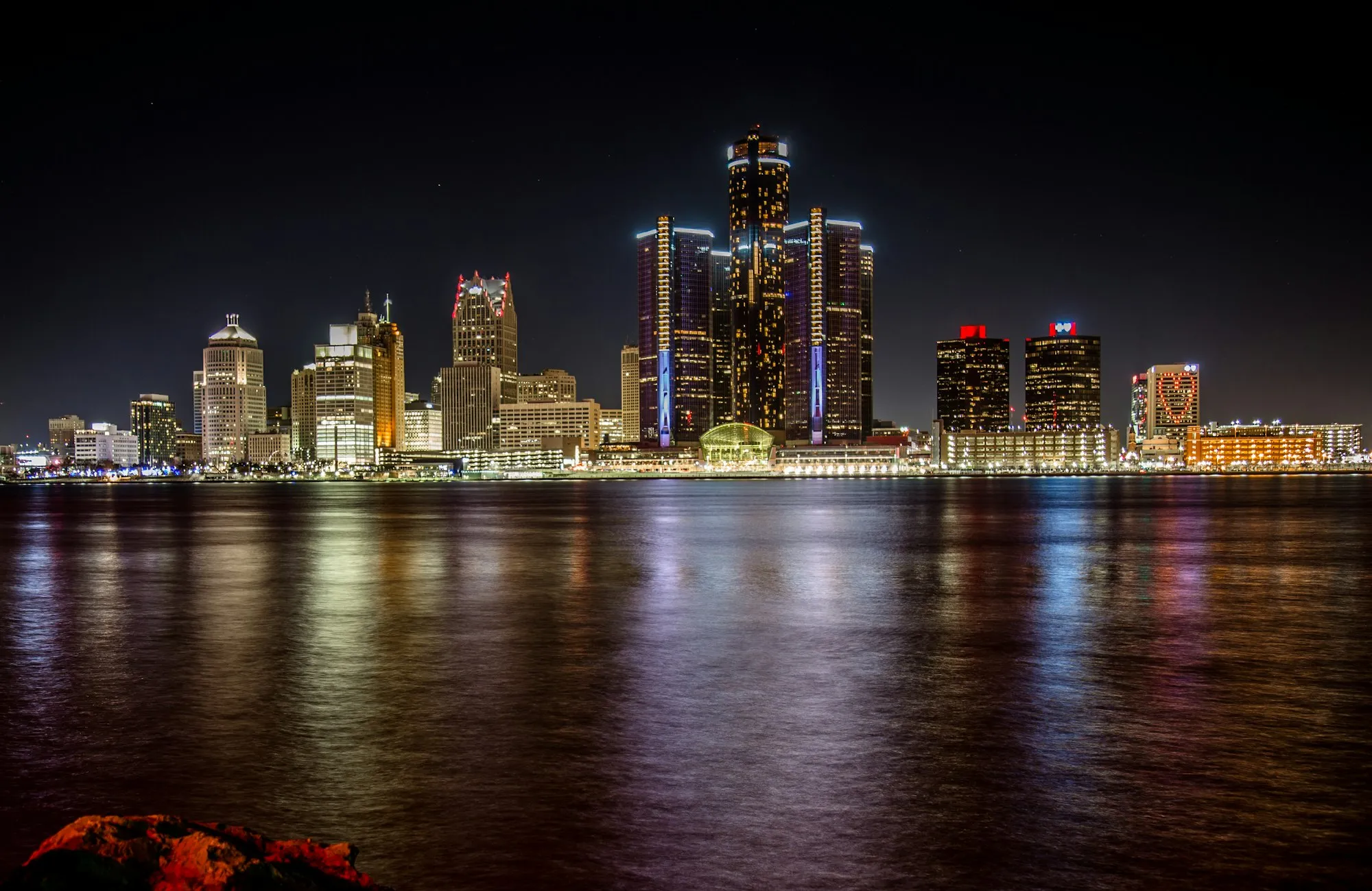 Detroit skyline at night over the Detroit River